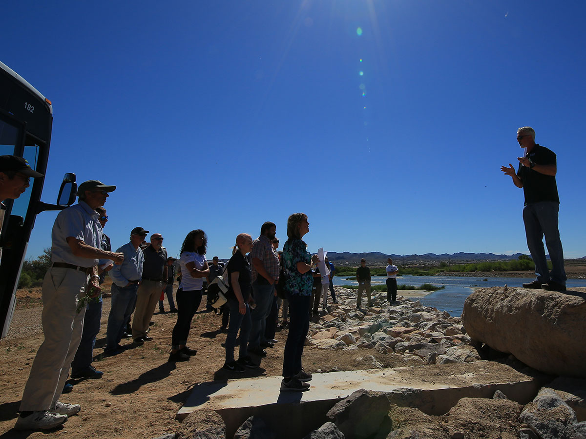 A biologist gives WaterSmart Innovations Conference attendees a tour of  the Las Vegas Wash